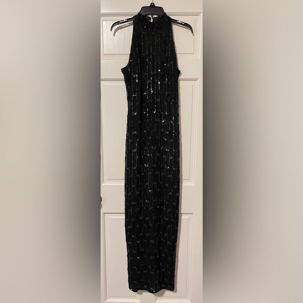 Size medium black sequins, floorlength evening gown
